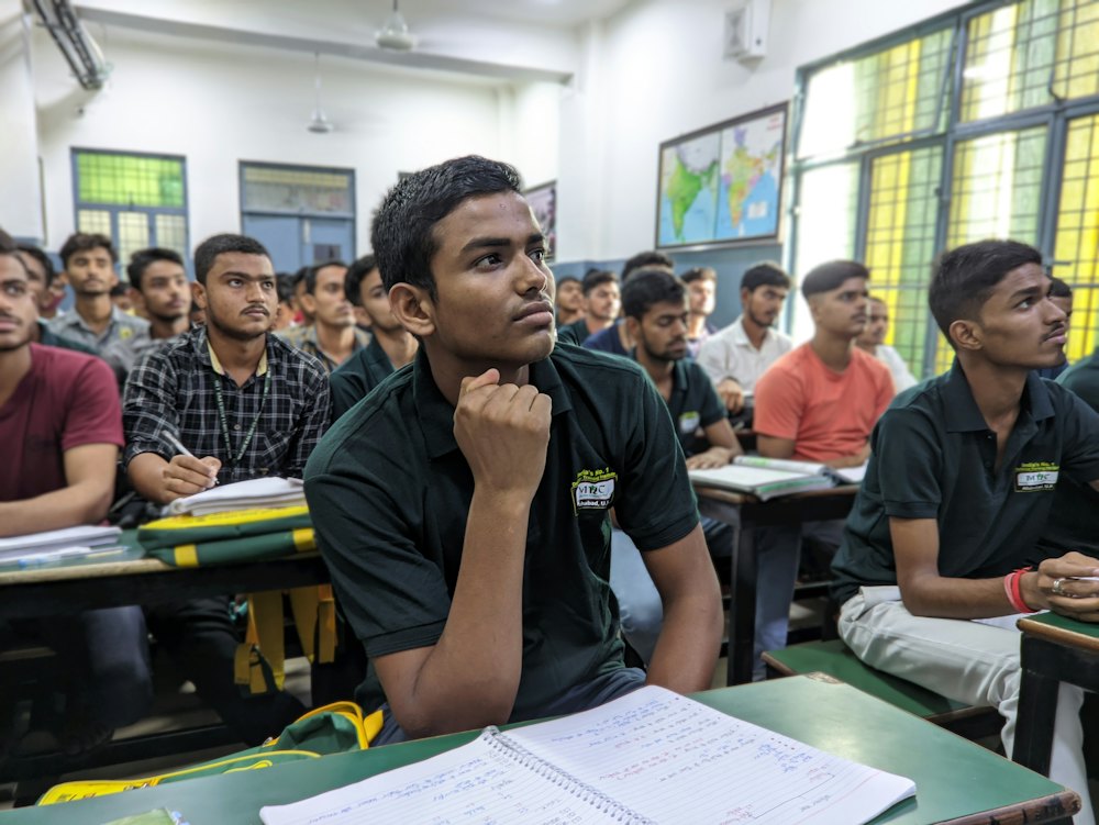 Engineering students listening in a college classroom